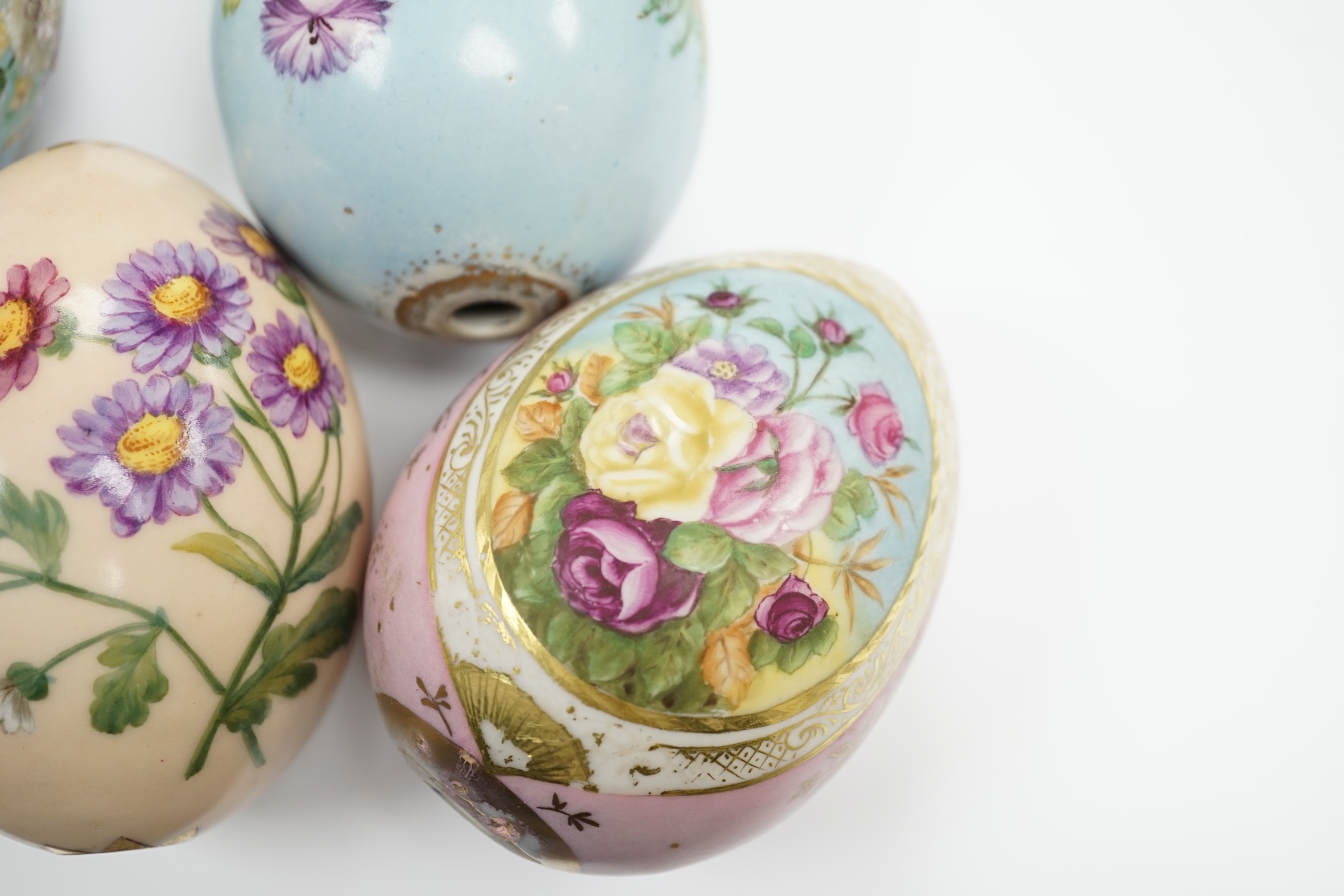 Four Russian porcelain Easter eggs, 19th century, 11cm high